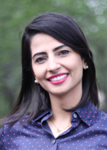 Headshot of Saeideh Heshmati with black hair and purple blouse.